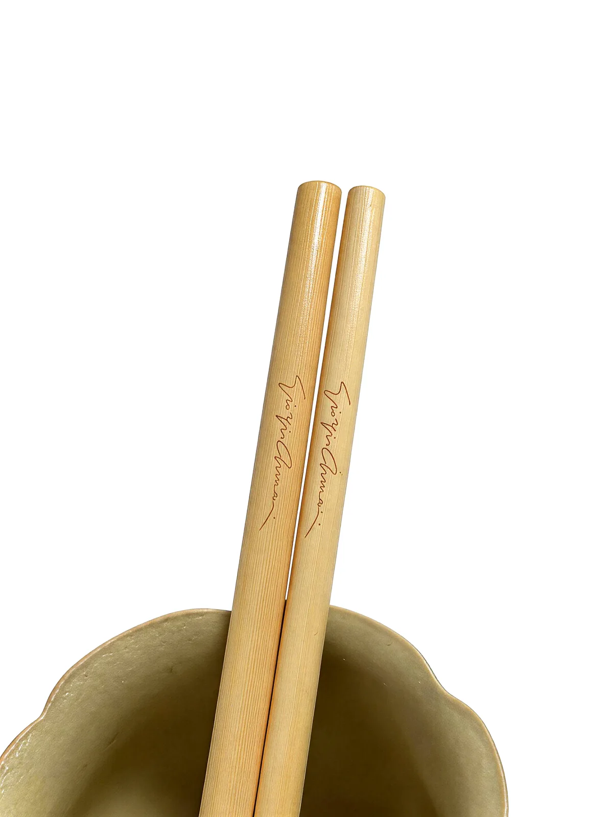 Pair of custom signed reed straws in ceramic cup
